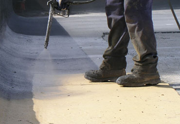 Coating systems over Phoenix spray foam roof systems
